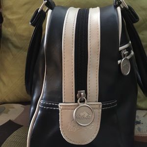 “ROOTS “ bowling bag purse.